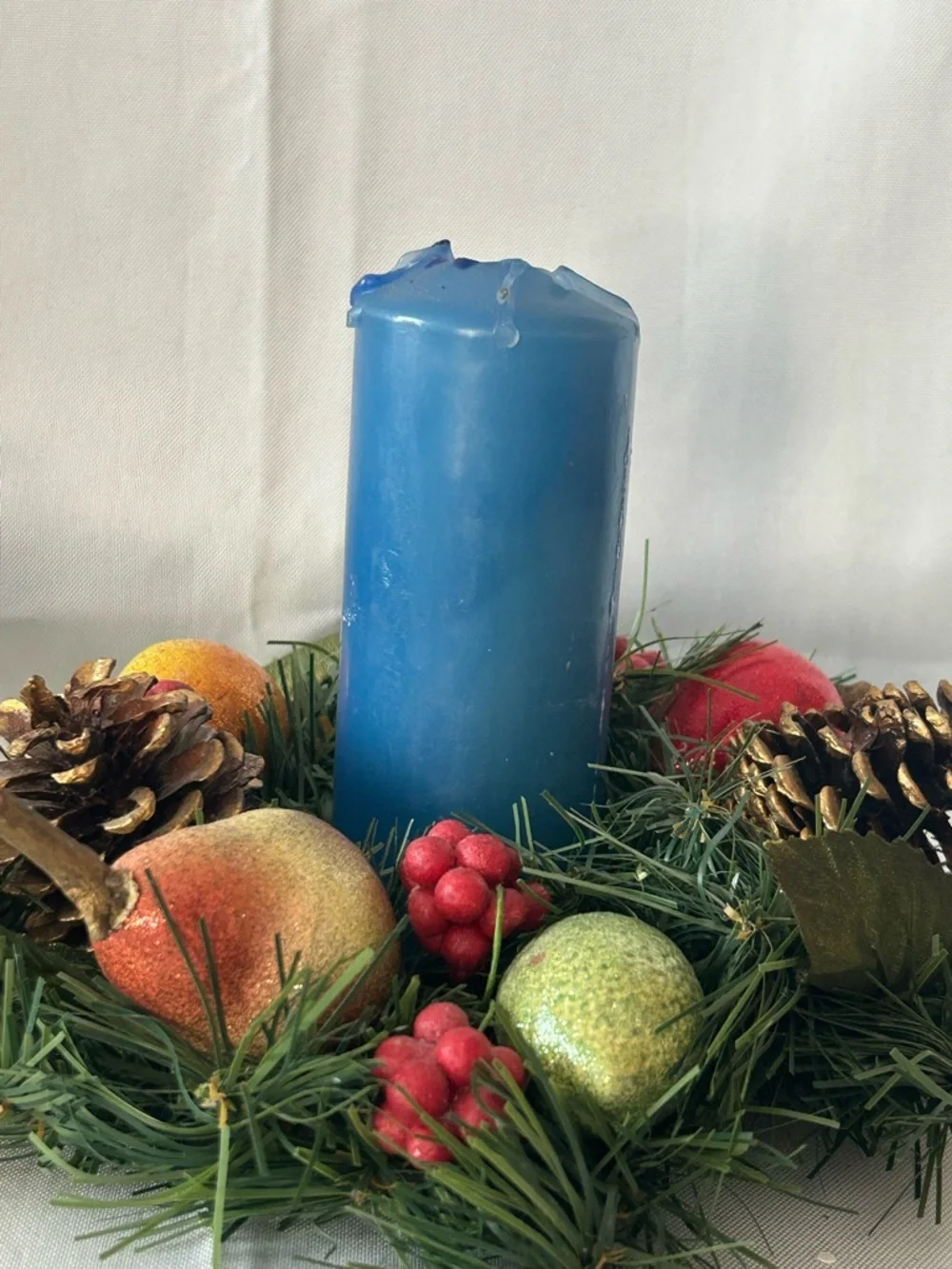 VTG artificial wreath/candle ring w/faux fruit, pinecones, and red berries.